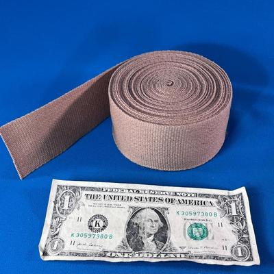 ROLL OF TAN STRONG DURABLE-LOOKING WEBBING STRAP MATERIAL 