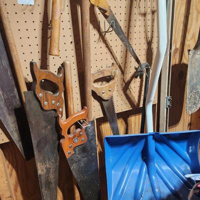 Tool lot Saws Shovels, Mallet, Rake,