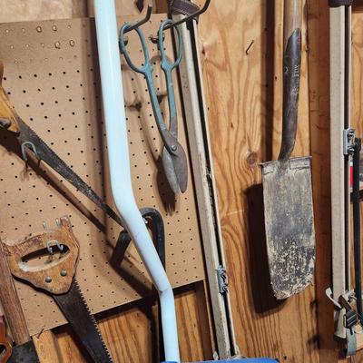 Tool lot Saws Shovels, Mallet, Rake,