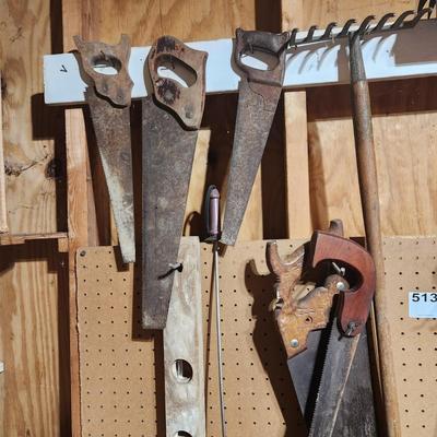 Tool lot Saws Shovels, Mallet, Rake,