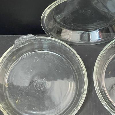 Three Vintage Clear Pie Plates - Pyrex - & 6 Oval and Round Aluminum Cake Pans