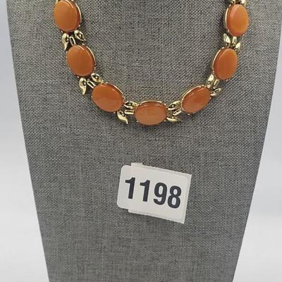 Orange Necklace as Earrings
