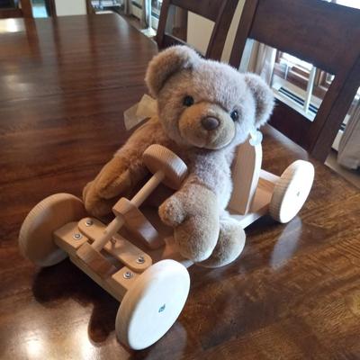 SWEET TEDDY BEAR DRIVING A WOODEN CAR