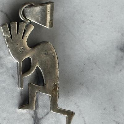 Beautiful  Kokopelli pendant made of silver and lapis