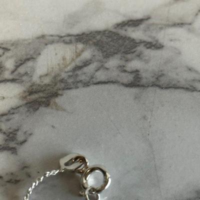 Small sterling silver pendant of child with sterling chain