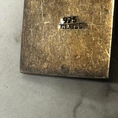 MCM sterling silver pendant