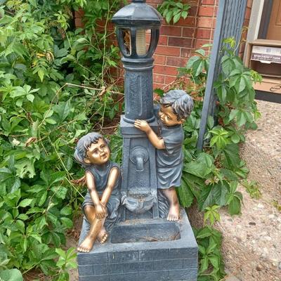 BOY AND GIRL LIGHTED WATER FEATURE