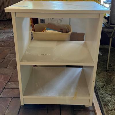 White bookshelf on wheels