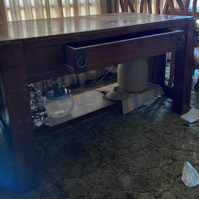 Dark oak wooden desk with center drawer
