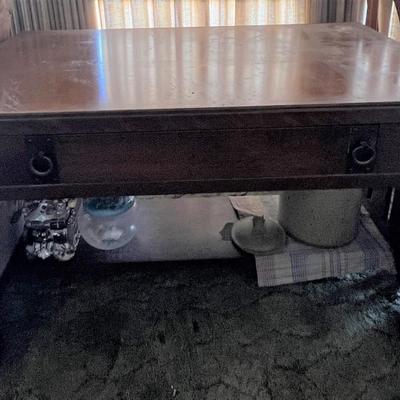 Dark oak wooden desk with center drawer
