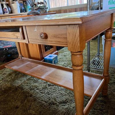 Wooden desk with keyboard tray and drawer