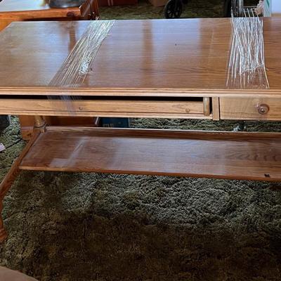 Wooden desk with keyboard tray and drawer