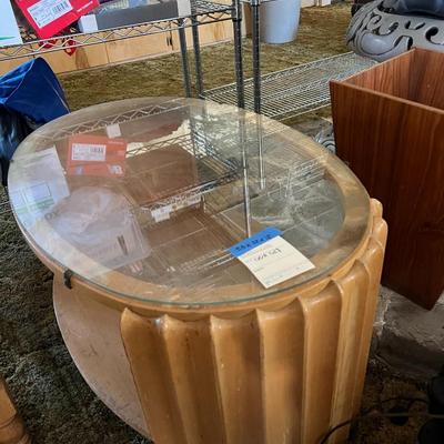 Oval wooden, glass top coffee table