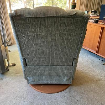 Swivel, reclining rocking chair