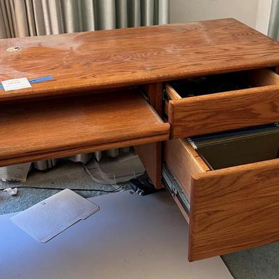 Oak desk with key board tray and two drawers