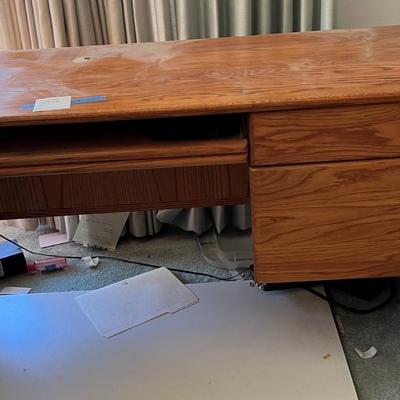 Oak desk with key board tray and two drawers