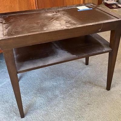 Dark brown wooden tray table