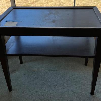 Dark brown wooden tray table