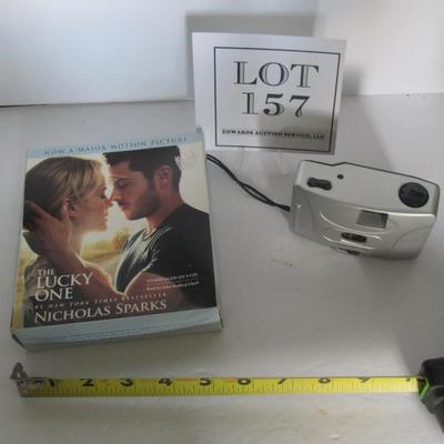 Audio Book CD: The Lucky One, and Cheap Camera With Unused Film Inside - Read Description