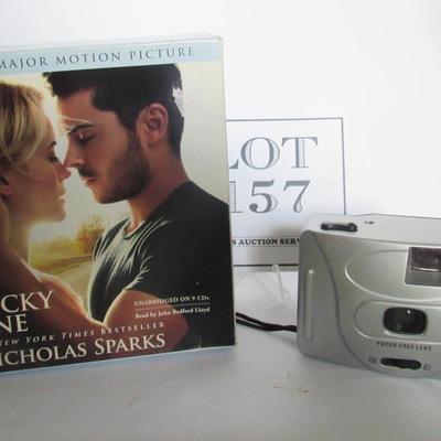 Audio Book CD: The Lucky One, and Cheap Camera With Unused Film Inside - Read Description