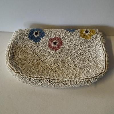 Japanese beaded purses with makeup compacts and pink depression glass heart dish