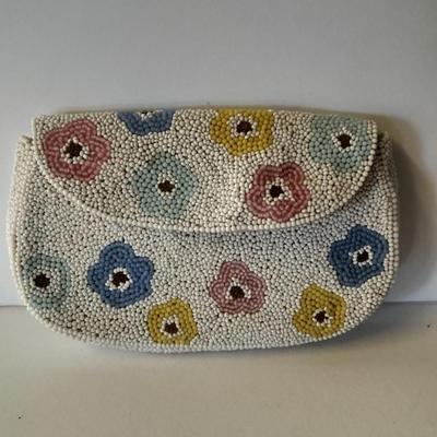 Japanese beaded purses with makeup compacts and pink depression glass heart dish