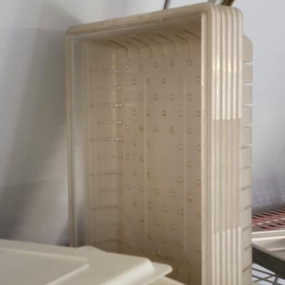 Tubs with drainage holes, bowls and jars