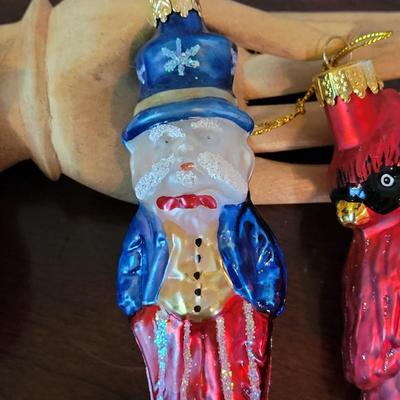 L115: Glass Red Birds, Uncle Sam, and Dog Houses Ornaments