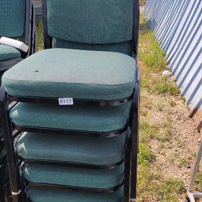8 Padded Green chairs.