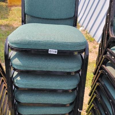 8 Padded Green chairs.