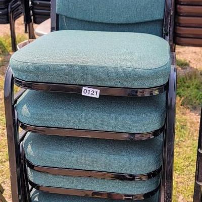 7  Padded Green chairs.