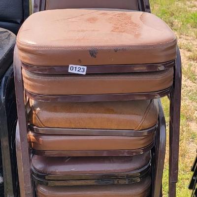 10 Brown padded chairs.