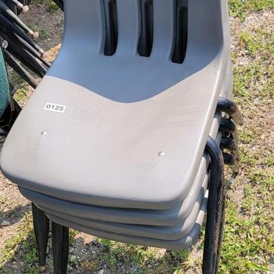 4 hard plastic chairs