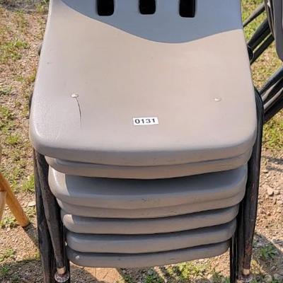 7 hard plastic chairs