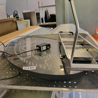 Drain pan, hand slicer, open sign..