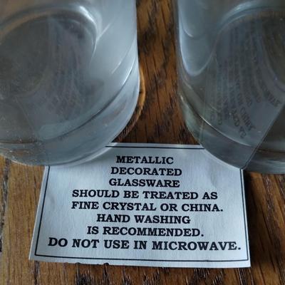 Four Drinking Glasses