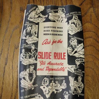 Slide rule with instructions