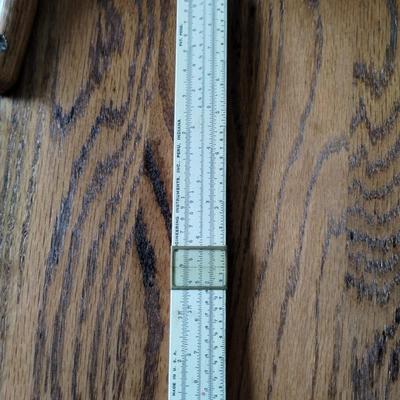 Slide rule with instructions