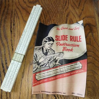 Slide rule with instructions