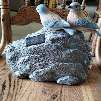 Solar powered outdoor bird decor