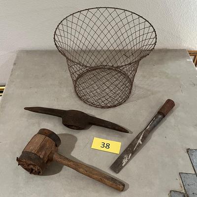 Wire basket with antique tools