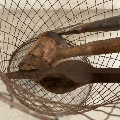 Wire basket with antique tools