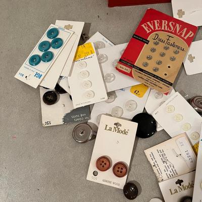 Cigar box of buttons
