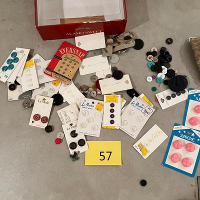 Cigar box of buttons