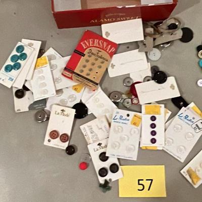 Cigar box of buttons