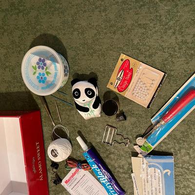 Cigar box of sewing items