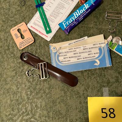 Cigar box of sewing items