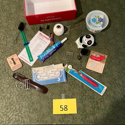 Cigar box of sewing items