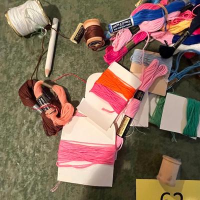 Lot of embroidery floss & rings