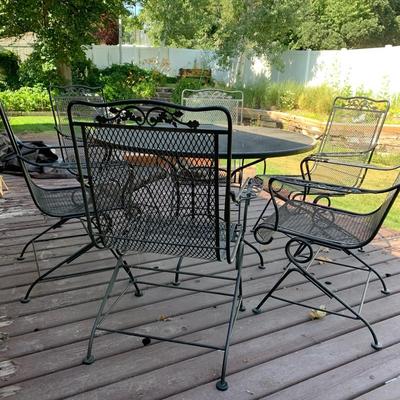 Iron Patio Table and 6 rocking chairs